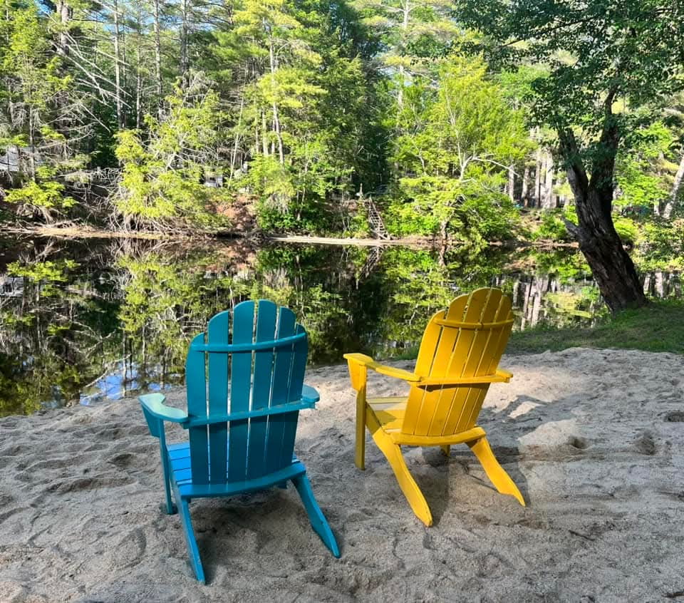 Sandy Beach with adirondack chairs